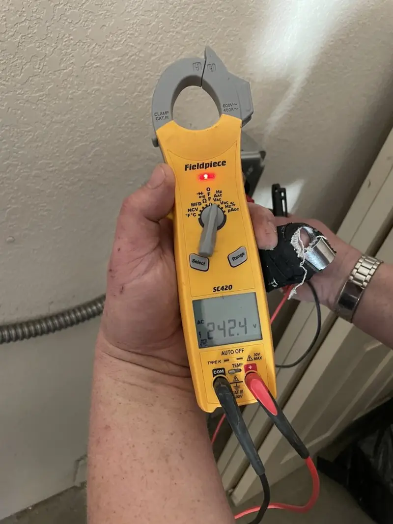 Voltage testing with clamp meter during Electrical Installation Services in Mifflinburg